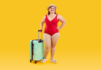 Full length happy beautiful confident smiling young fat woman in red swimsuit, flip flops and sun...