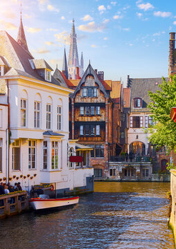 Bruges, Belgium. Ancient medieval architecture of brugges. Old stone and wooden houses above water channels in Brugge. Historic town, famous european landmark.