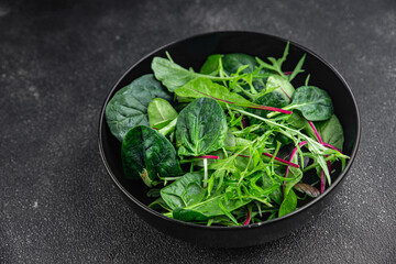 Healthy green salad mix, leaves  juicy snack healthy eating cooking appetizer meal food on the table copy space food background rustic 