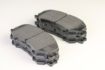 Front and Rear New Brake Pads For Modern Car.
