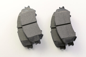 Front and Rear New Brake Pads For Modern Car.