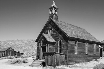 Deserted church in the arid desert of California's Bodie State Historic Park, an abandoned mining...