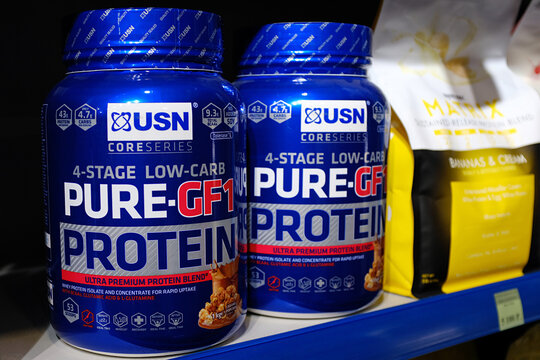 protein dietary supplement on the shelves in the store. selling sport protein dietary supplement offline