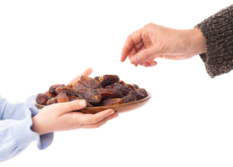 Unrecognizable caucasian child holding full wooden plate of date fruits. Woman hand taking one. Side view isolated white background. Copy space. Islam hold month Ramadan special snack concept image.