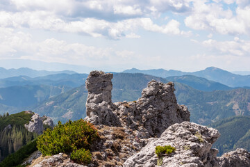 Panoramic view of unique rock formation in Hochschwab mountain range, Styria, Austria, Scenic hiking trail from Karlhochkogel via Kaefereck to Sankt Ilgen. Escapism in remote Austrian Alps. Wanderlust