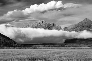 Papier Peint photo Chaîne Teton Classic black and white landscape art of fog and clouds in Jackson Valley, summer meadow and mountains of Grand Teton National Park Wyoming, USA.