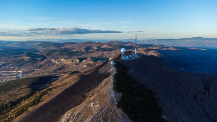 Aerial view of Mount Učka and Vojak Peak overlooking Opatija in Croatia сaptured from a drone