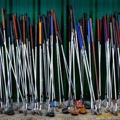 Row of Old Golf Clubs Sports