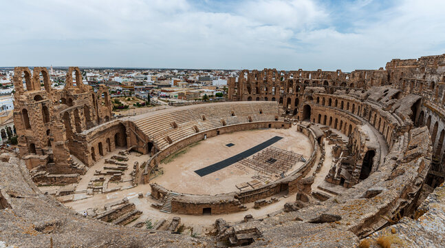 Amphitheatre of El Jem in Tunisia. Amphitheatre is in the modern-day city of El Djem, Tunisia, formerly Thysdrus in the Roman province of Africa. It is listed by UNESCO since 1979