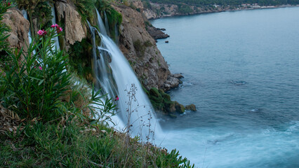 Lower Düden Falls drop off a rocky cliff falling from about 40 m into the Mediterranean Sea in...