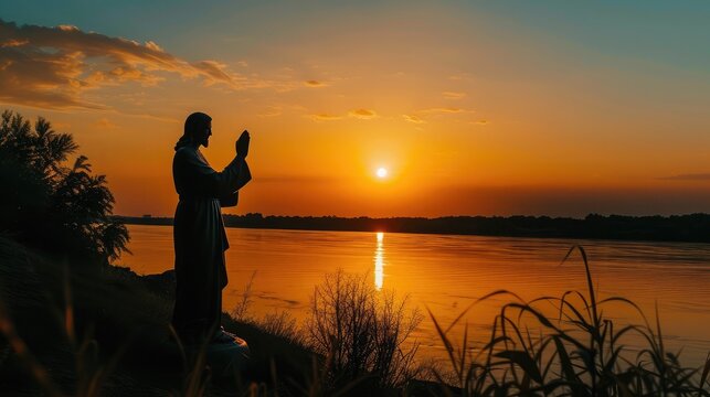 Silhouette Jesus and the sunset