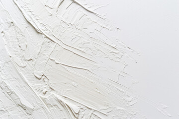 Dynamic white paint strokes with texture and depth, creating a bold and artistic pattern on a flat surface.