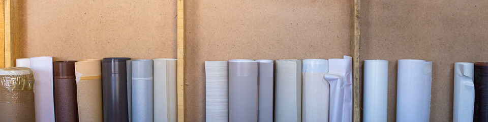 rolls of film for MDF panels lying in the furniture workshop ready for stickers on products