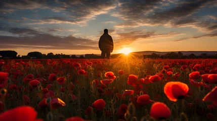 Zelfklevend Fotobehang A serene sunrise over a field of poppies, with a lone soldier paying respects at a war memorial. © Love Mohammad