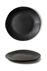 top and side view of a large black stoneware plate isolated on a white background