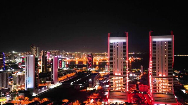 Aerial night shot over the city views Izmir Turkey. High quality 4k footage