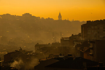 Fototapeta premium Air pollution and Istanbul city buildings in smoke