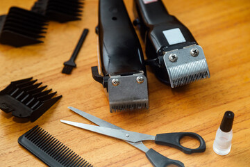 Hairdresser tool of work. Hair clipper machines, comb, scissors.