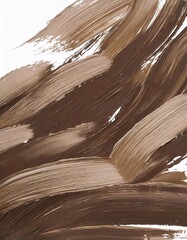Brown paint brush strokes on a white background, close-up.