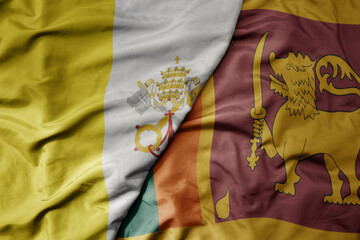 big waving national colorful flag of sri lanka and national flag of vatican city.
