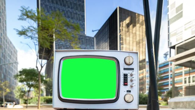 vintage television and skyscraper timelapse