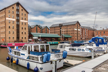 Motorboats moored in Victoria Basin, Gloucester Docks, England, UK - obrazy, fototapety, plakaty