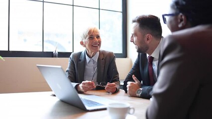 Business partners planning business with coffee