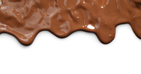 Tasty melted milk chocolate pouring down on white background