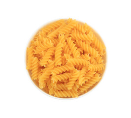 Raw fusilli pasta in bowl isolated on white, top view