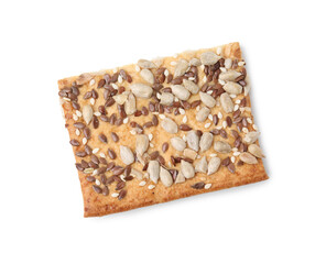 Cereal cracker with flax, sunflower and sesame seeds isolated on white, top view