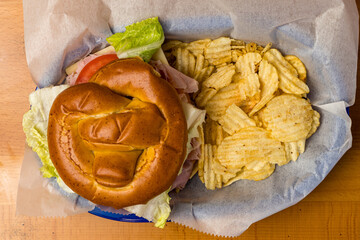 Ham and cheese on a pretzel bun
