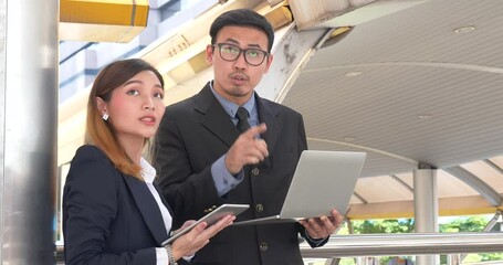 Business Partner using digital tablet online meeting team Partnership businessman, businesswoman talking together. Diversity Asian Business Partner online meeting trust teamwork. Asian Business team