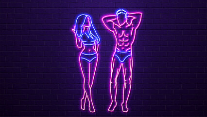 Neon sexy woman and man with a beautiful pumped-up body in blue and pink on a brick wall background. - obrazy, fototapety, plakaty