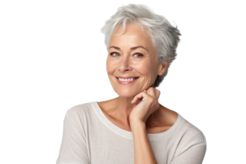 Happy middle aged woman, senior older 50 year lady looking at camera touching her face isolated on white close up face portrait