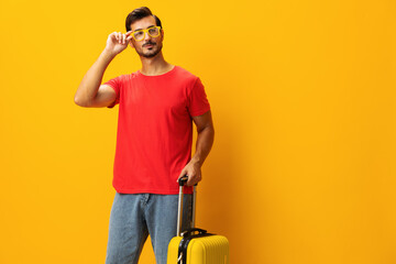 Weekend man journey studio suitcase traveler travel happy trip baggage background vacation yellow...