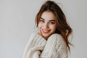 Portrait of happy woman wear white sweeter looks in camera isolated on white background