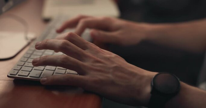 Hands, typing and computer for online research, article or editing on website for night deadline at office desk. Person, journalist or editor closeup with desktop keyboard for report and information