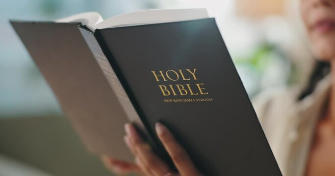Hands, reading and woman with bible at her home for worship, religion or spiritual wellness. Praise, healing and closeup of female person studying holy book for christian faith and peace in apartment