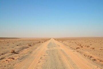 Fototapeta na wymiar Empty desert road extending towards the horizon Symbolizing adventure and exploration