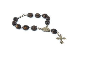 Rosary with wooden beads isolated on white background