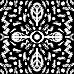 Seamless pattern with tribal ethnic motifs. Black and white background.
