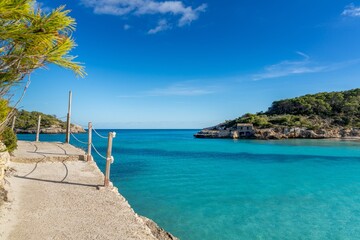 walkway along the turquoise waters of the idyllic Parc Natural de Mondrago in southeastern Mallorca...