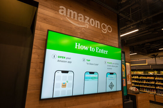 Seattle, WA, USA - Dec 20, 2023: How to Enter instructions are seen at the entrance to an Amazon Go store, a cashierless chain convenience store at Amazon's headquarters campus in Seattle, Washington.