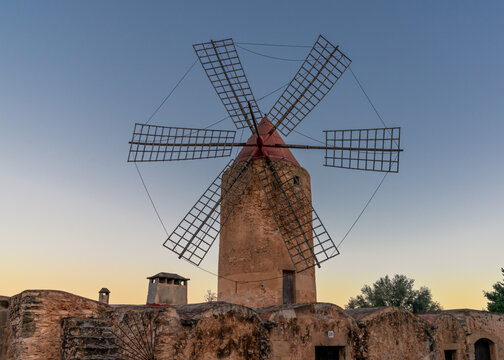 historic windmill in the country town of Algaida in the interior of Mallorca at sunrise