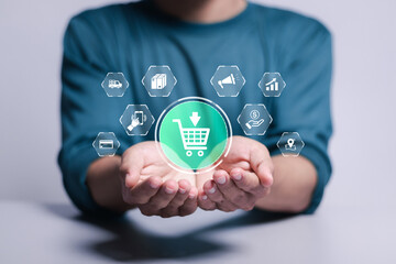 Online Shopping concept. Person holding online shopping icon on virtual screen. online shopping...
