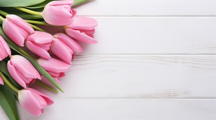 Obraz na płótnie Canvas Beautiful pink tulips on white rustic wooden background flat lay. flowers in soft morning sunlight with space for text. greeting card concept