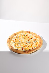 Italian Quattro Formaggi Pizza with Four Cheeses on White with Shadow