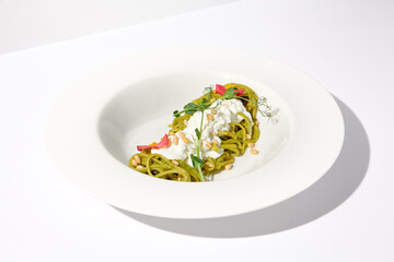 Pesto Pasta with Stracciatella Cheese Garnished with Pine Nuts and Edible Flowers, Perfect for...
