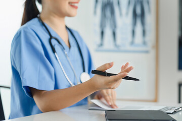 Medical Professional Recording Patient Information During Health Assessment.