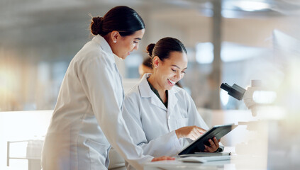 Scientist, women and teamwork on tablet and computer for laboratory advice, medical research and...